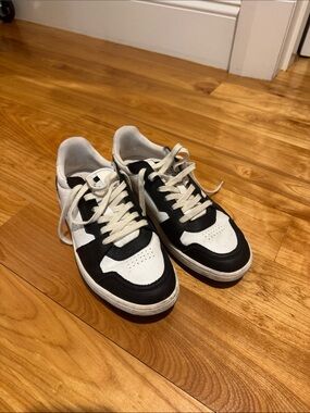 Axel Arigato Black and White Low-Top Sneakers